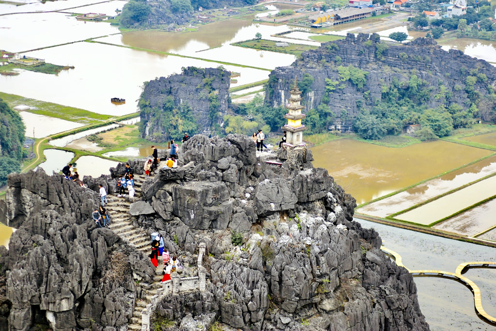 Mua Cave is famous for its 486 steps, leading visitors to the mountain's summit