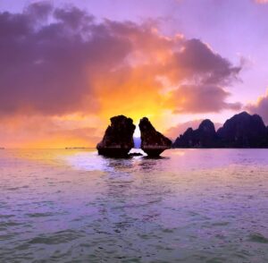 Fighting Cock Island at sunset, an iconic must-visit attraction in Ha Long Bay