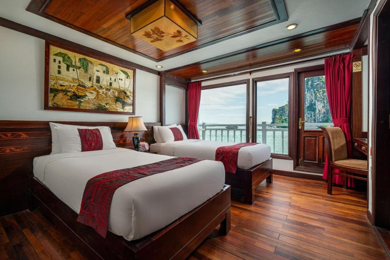 7 Best HaLong Bay Cruises for an Epic Journey 5 Luxury cabin on Indochina Sails cruise with private balcony and seafood, Ha Long Bay cruises