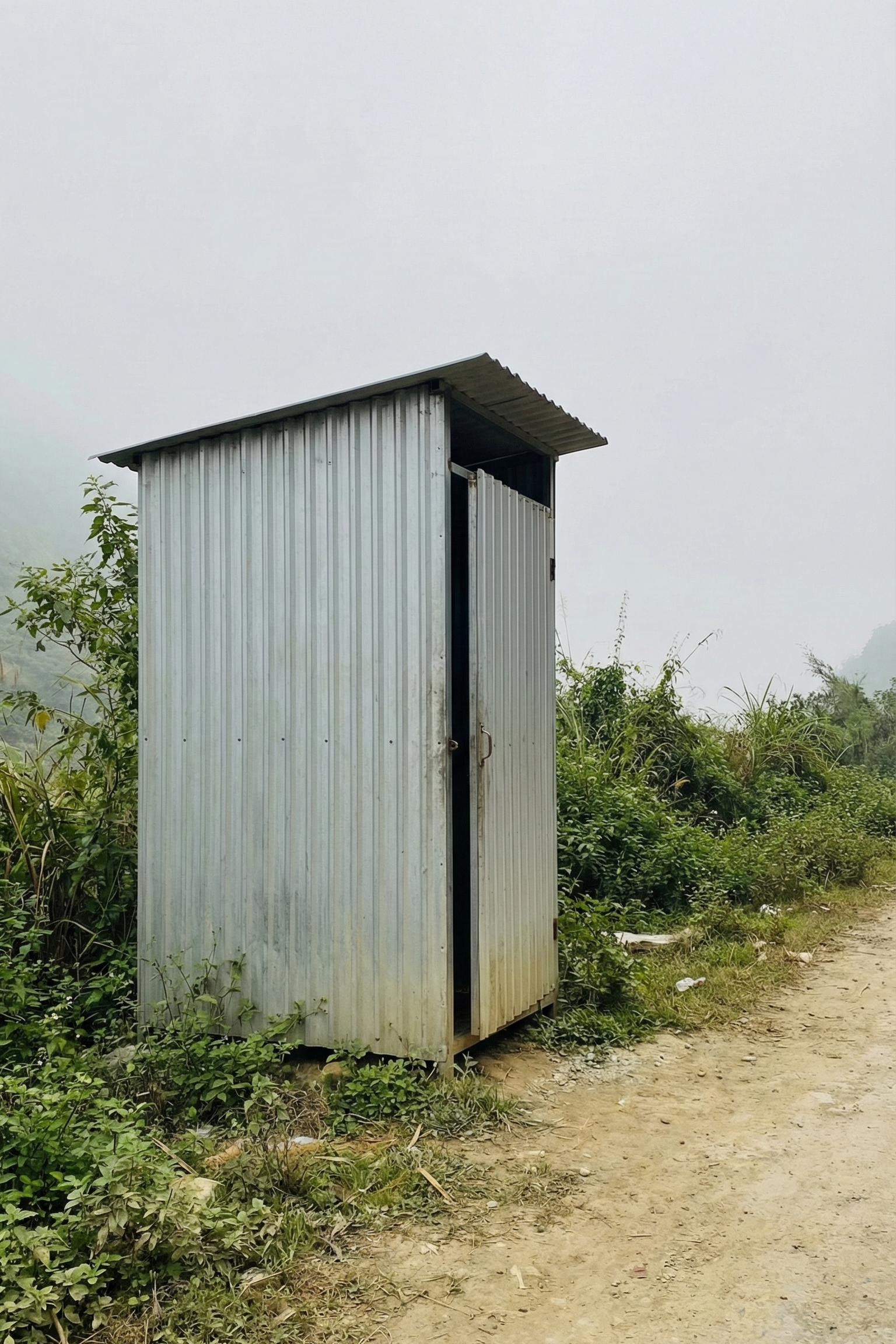 (2026) A Solo Female Guide to the Hanoi to Ha Giang Loop 62 tin sheds on the side of mountain roads to pee