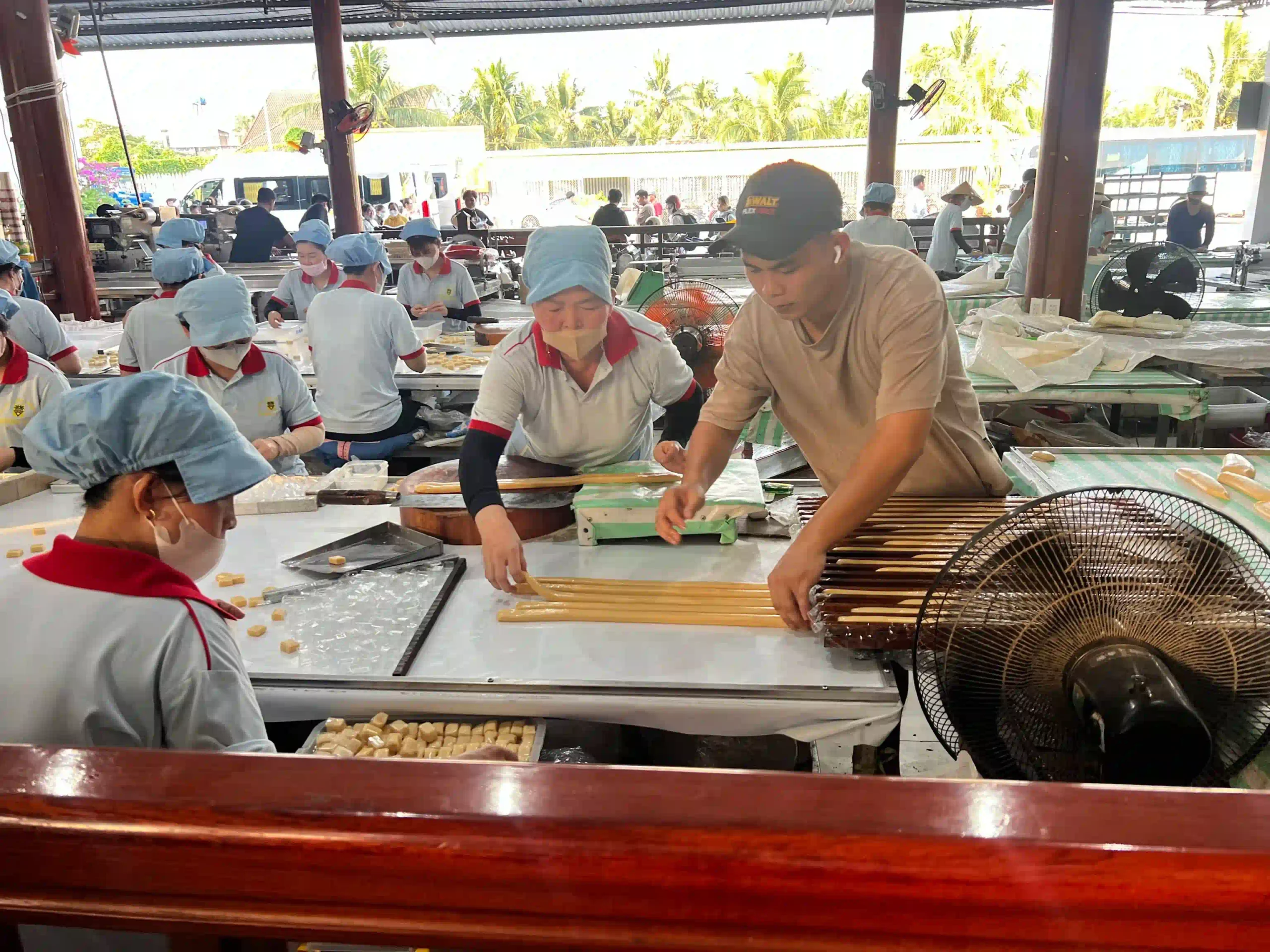 Best way to spend 5 days in Ho Chi Minh City for travelers 69 coconut candy workshop 2 scaled Vietadvisor
