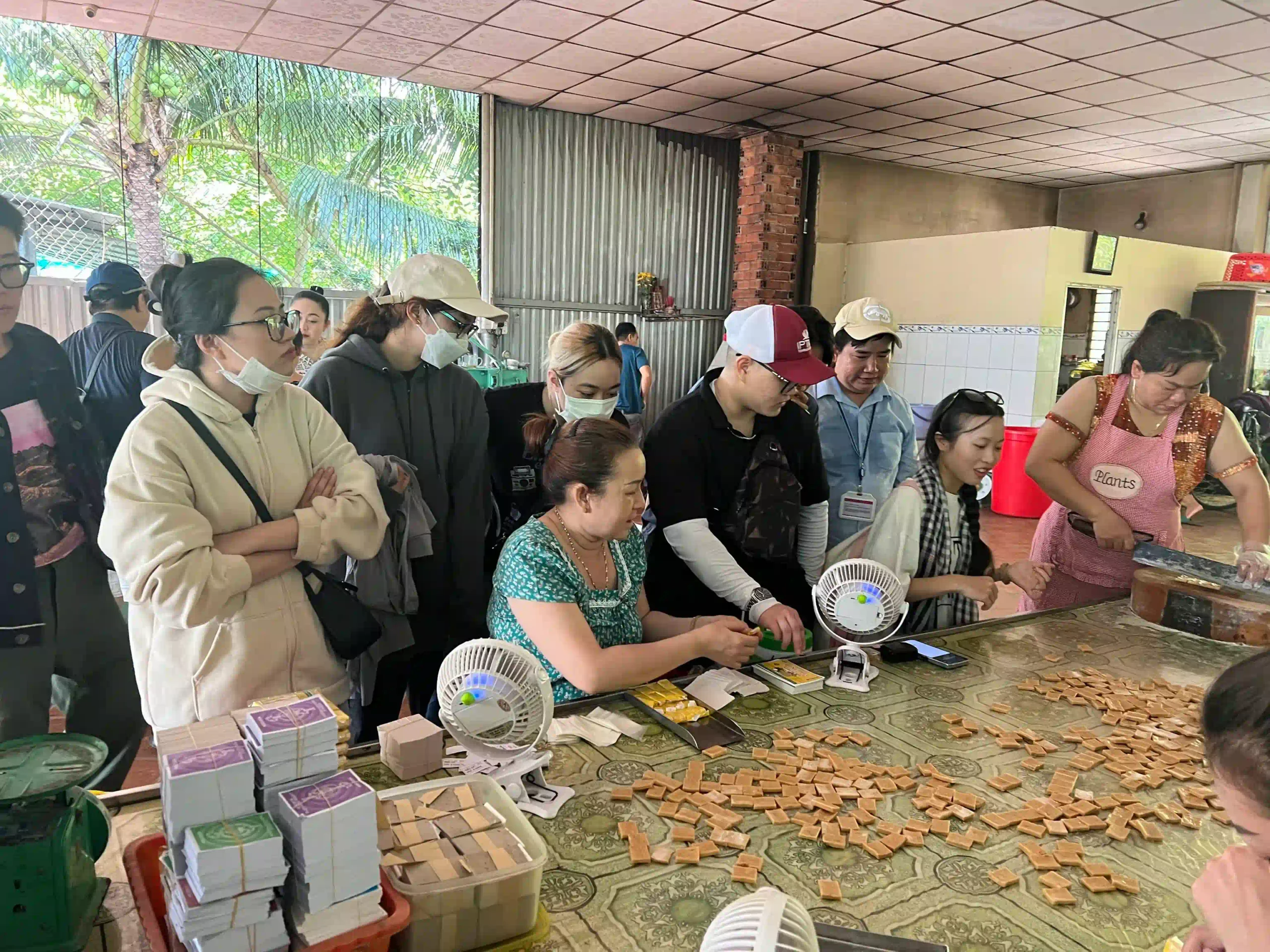Best way to spend 5 days in Ho Chi Minh City for travelers 68 coconut candy workshop scaled Vietadvisor