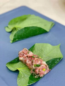 Fresh spring rolls, using a green wrapping leaf instead of rice paper 2