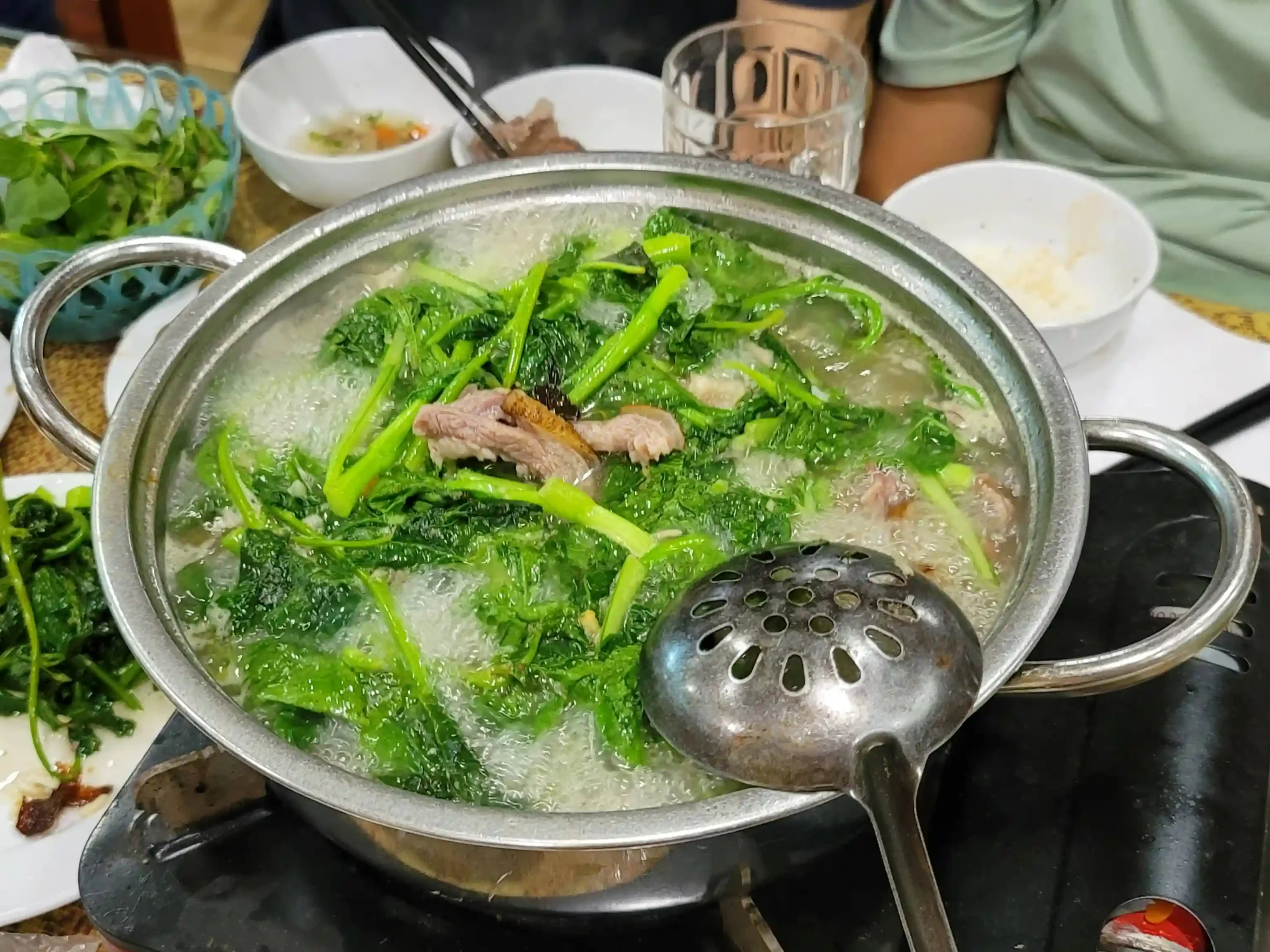 Ninh Binh food guide: What to eat and where to find it 41 Lau de goat hotpot scaled Vietadvisor