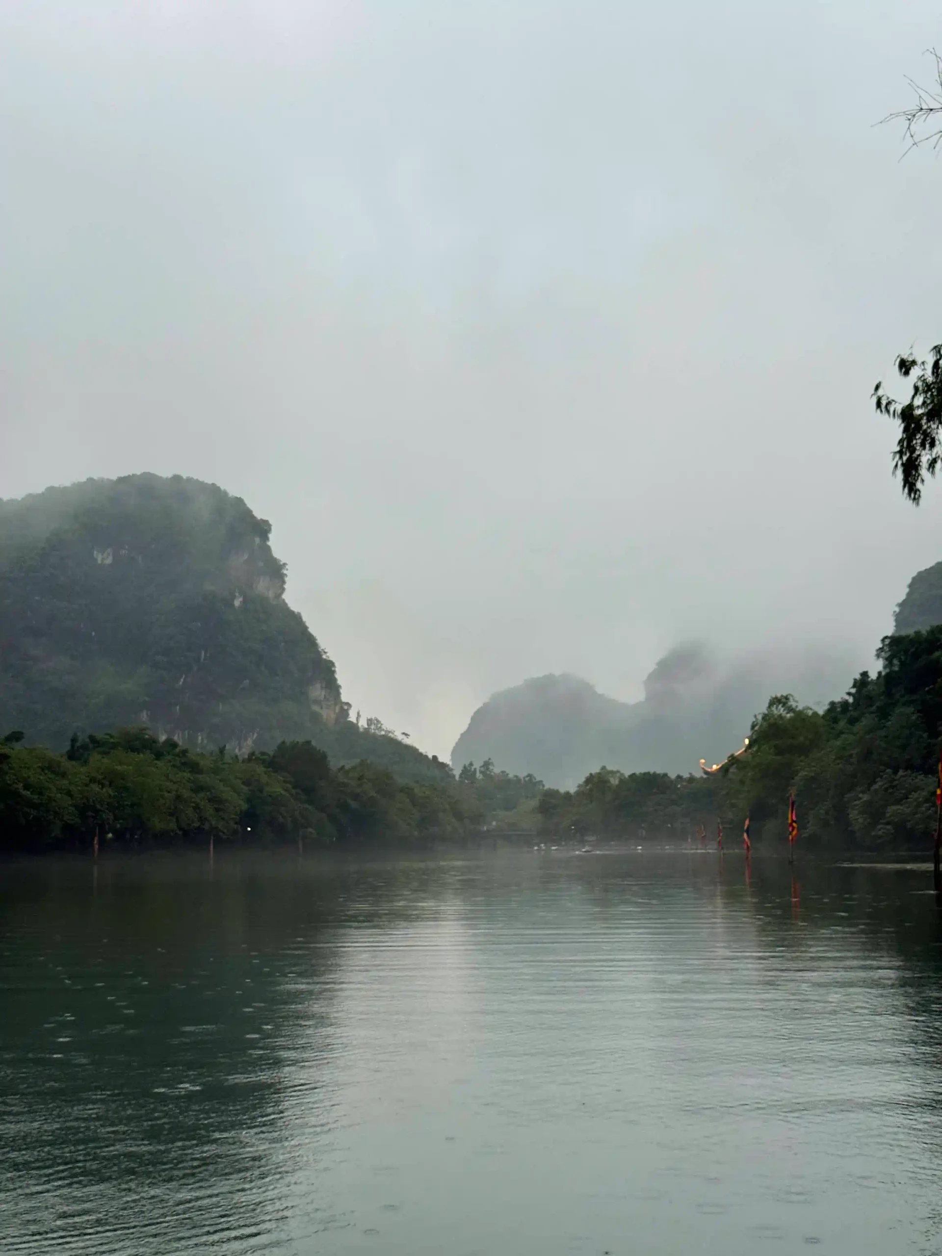 5 ways to enjoy Ninh Binh on rainy days 8 Take the Boat Tour Anyway trang an ninh binh rainny 2 scaled Vietadvisor
