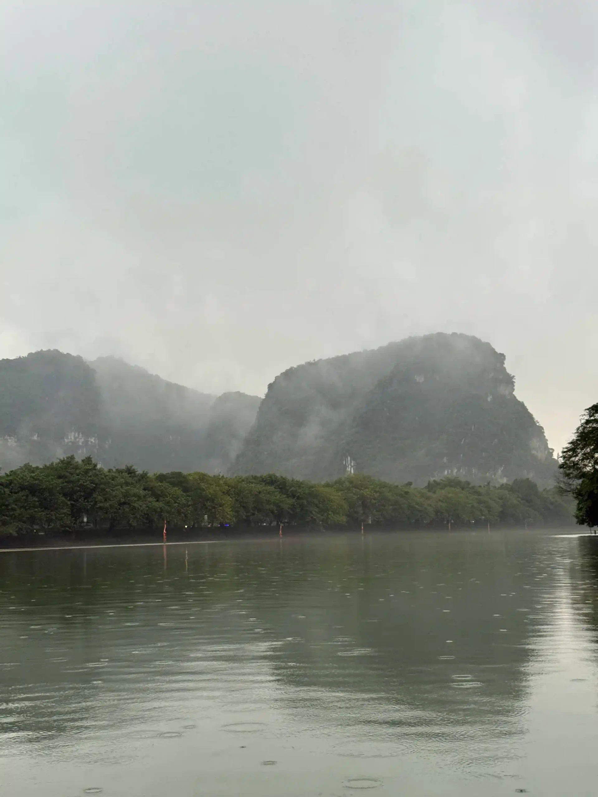5 ways to enjoy Ninh Binh on rainy days 7 Take the Boat Tour Anyway trang an ninh binh rainny 3 scaled Vietadvisor