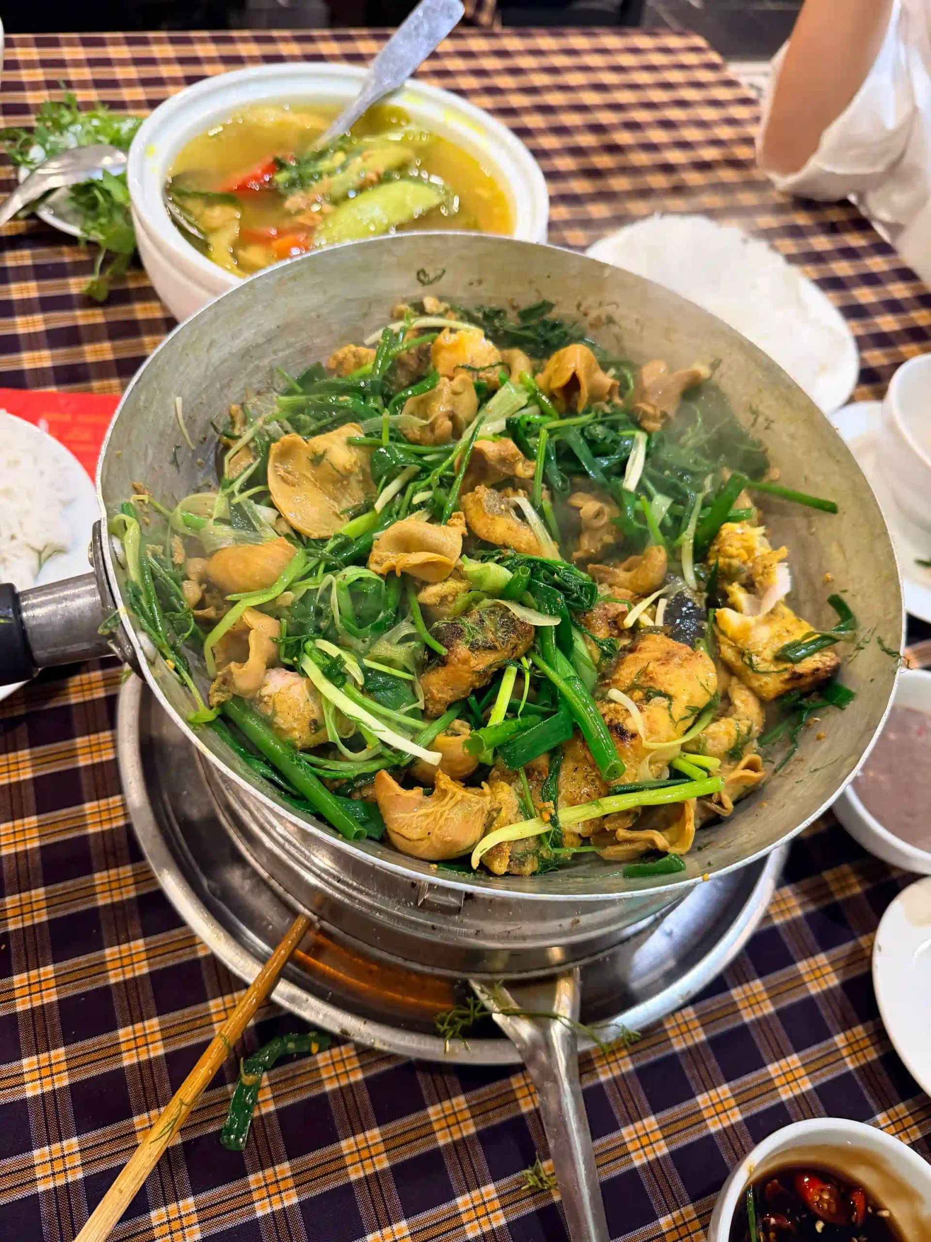 Should you visit Hanoi or Ho Chi Minh City for short trip? 60 cha ca la vong scaled Vietadvisor