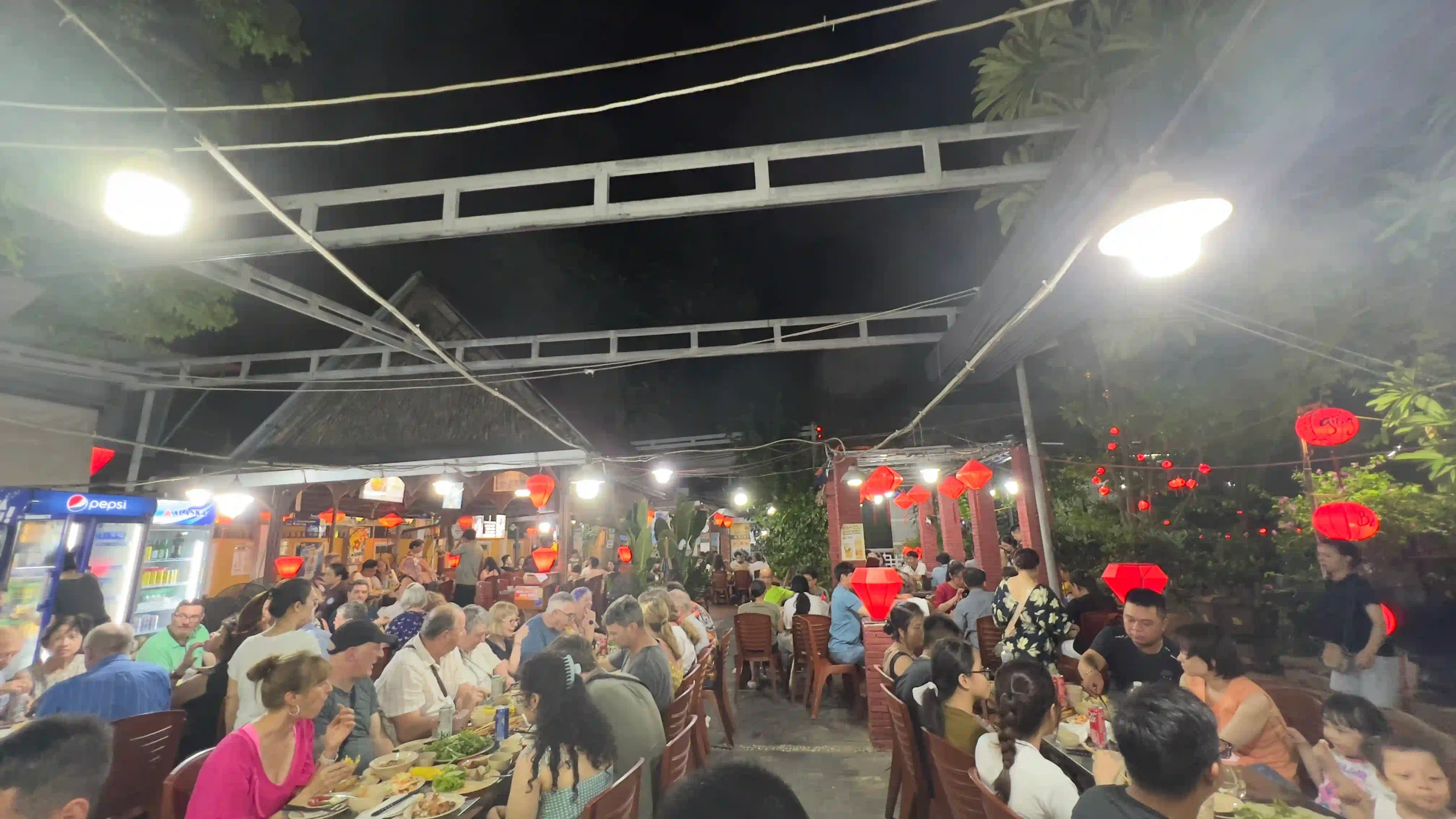 Is a Hoi An evening walking food tour worth the money? 14 Banh xeo nem lui grilled pork crispy spring rolls ba le well hoi an food tour 2 scaled Vietadvisor