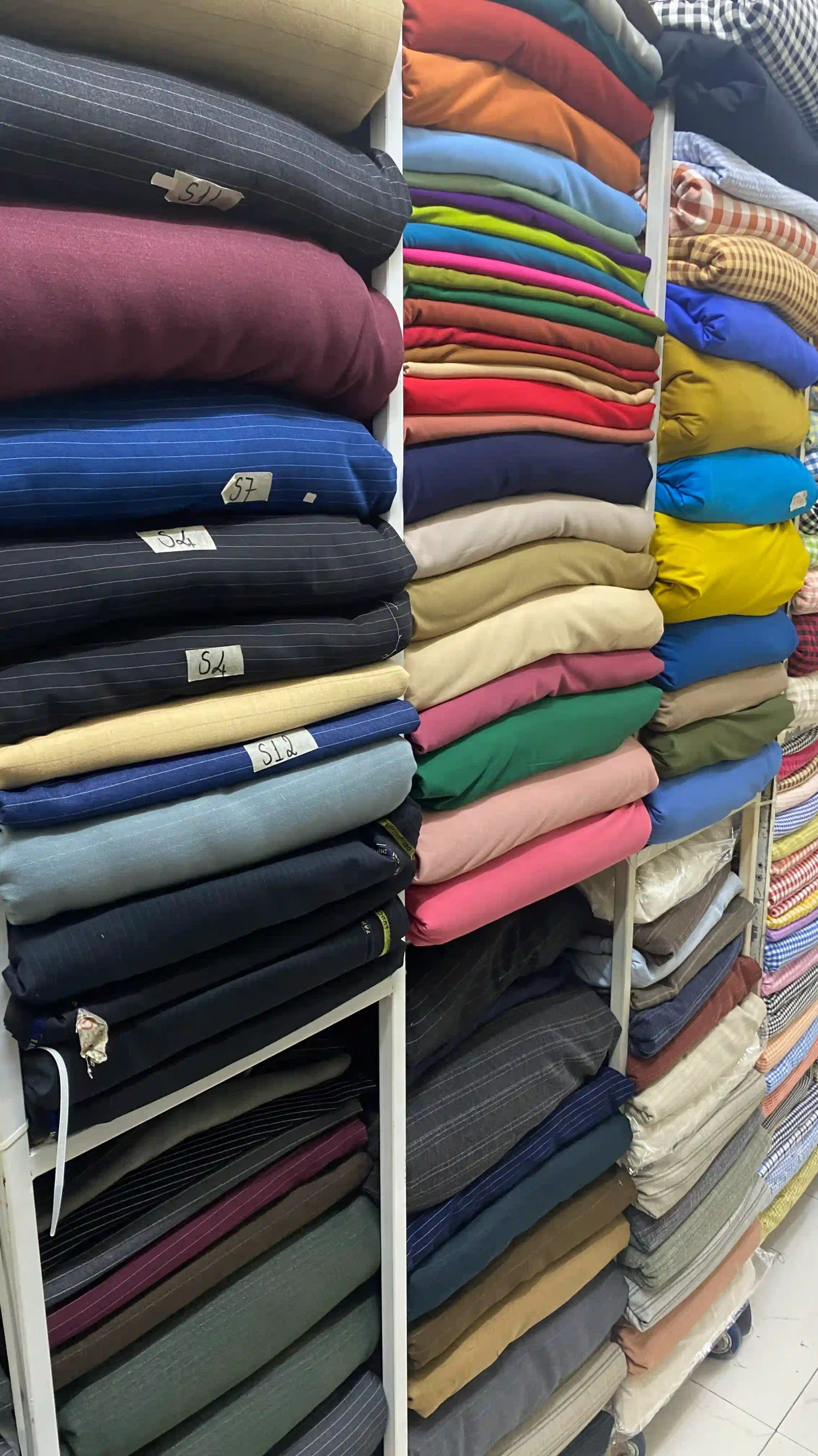 3 best custom clothes in Hoi An: Which one to choose? (2026) 29 The fabric you choose hoi an tailors scaled Vietadvisor