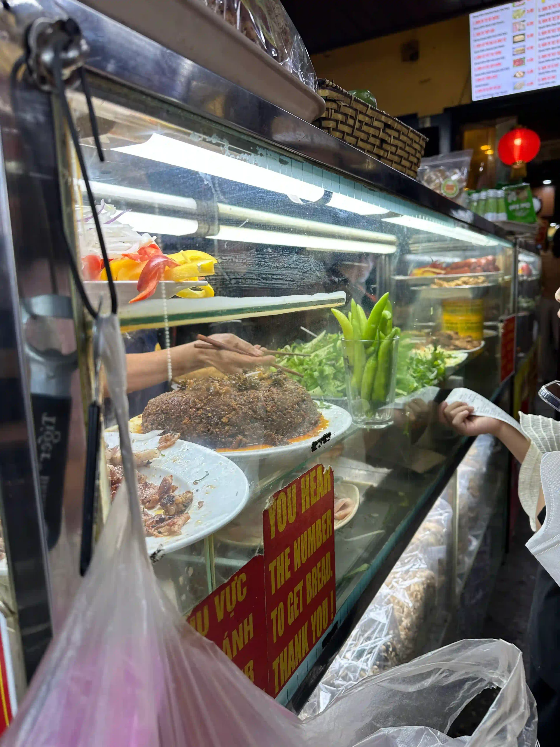 Is a Hoi An evening walking food tour worth the money? 8 The queue at Banh Mi Phuong hoi an food tour 4 scaled Vietadvisor