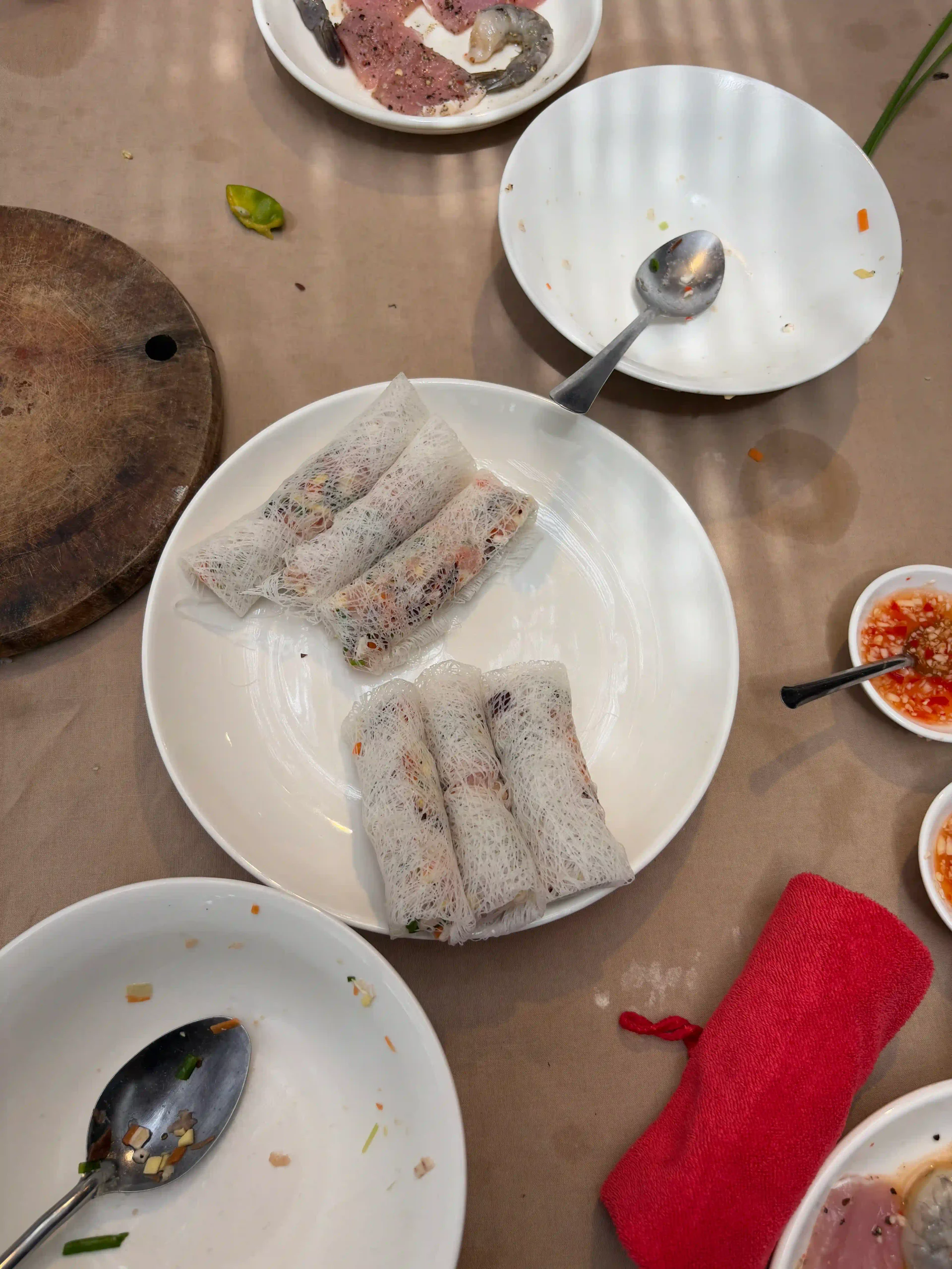 Hoi An cooking class & boat ride combo review: Worth it? 3 spring roll hoi an cooking class 2 scaled Vietadvisor