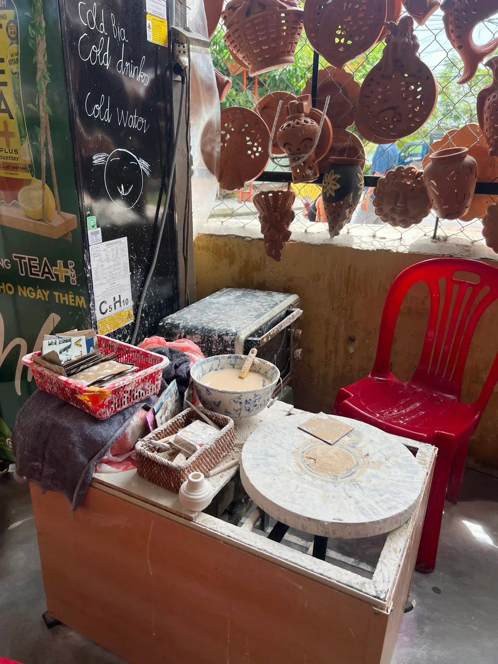 How to visit Thanh Ha Pottery Village Hoi An (self-guided) 23 family at Ceramic Village Museum 7 scaled Vietadvisor