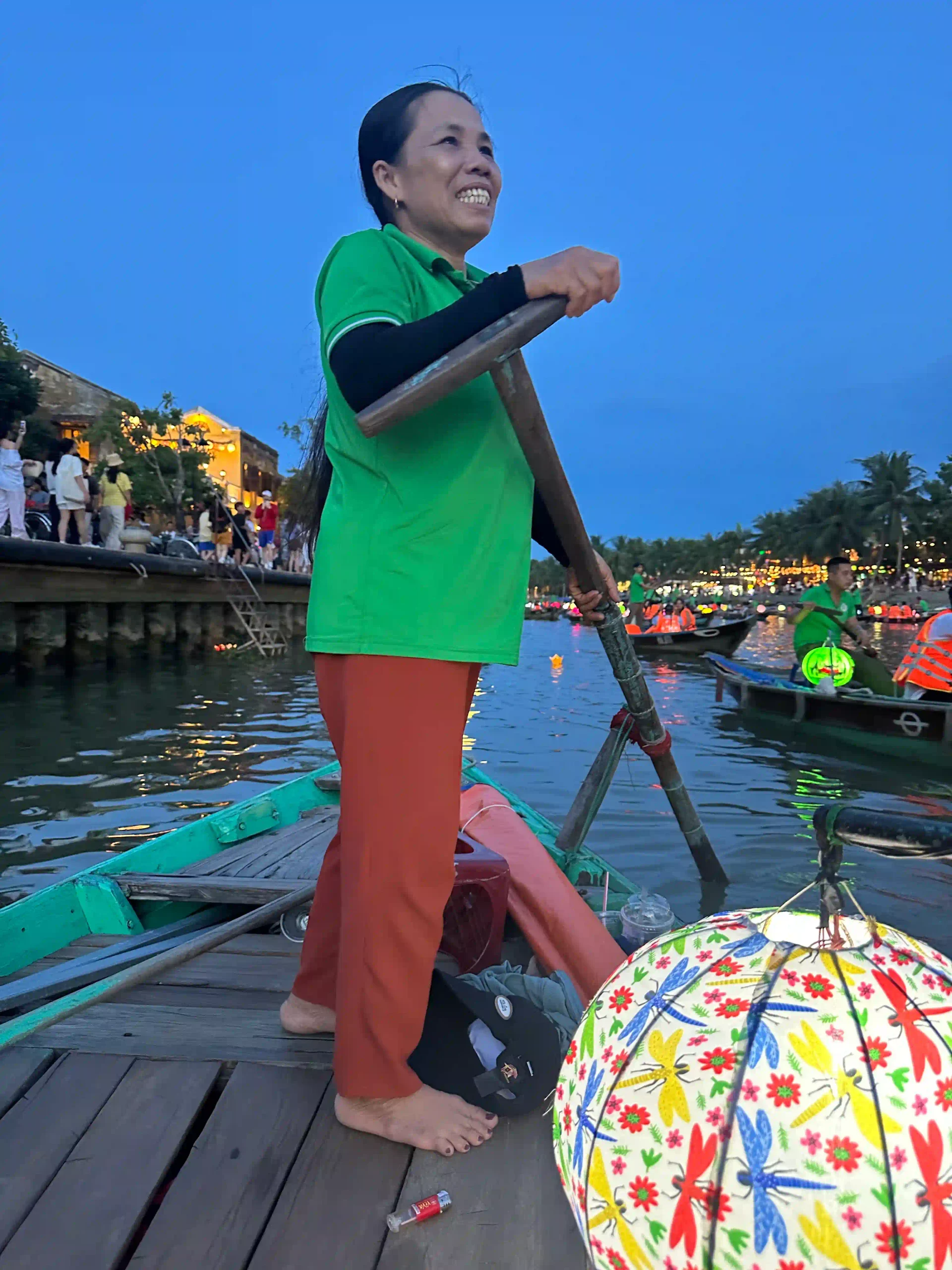 Review: Is the Hoi An lantern boat ride really worth it? 29 lower the lantern onto the water 4 scaled Vietadvisor