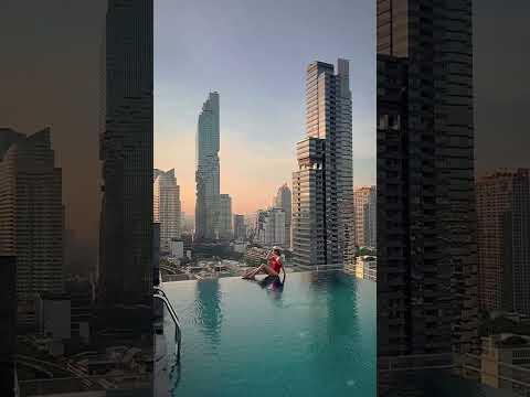 Bangkok from a rooftop infinity pool! Would you stay here? #bangkok #thailand #travelshorts