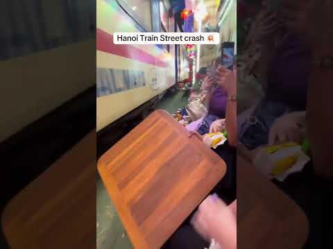 hanoi train street accident | 🚆 Tourists shocked as train passes inches away 😱