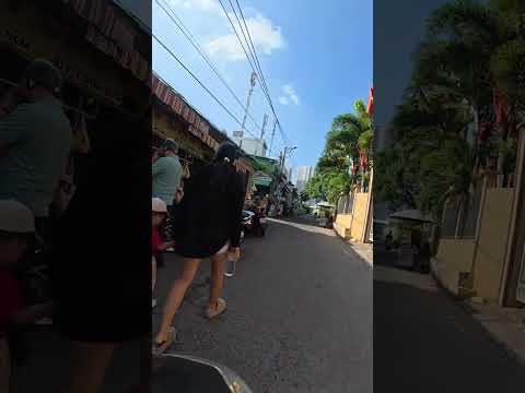 Mom and her son walked on Saigon street #shorts #saigonstreet #walking #travel #hochiminhcity