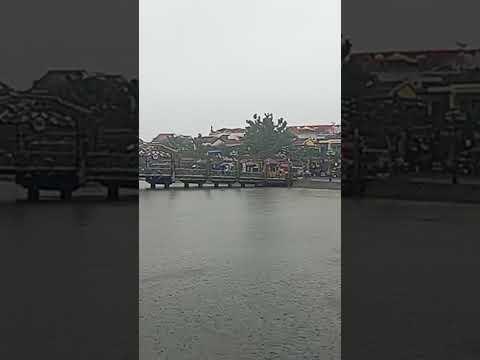beautiful rainy scene in Hoi An UNESCO ancient town #bicycle tours #vietnambiketours.com
