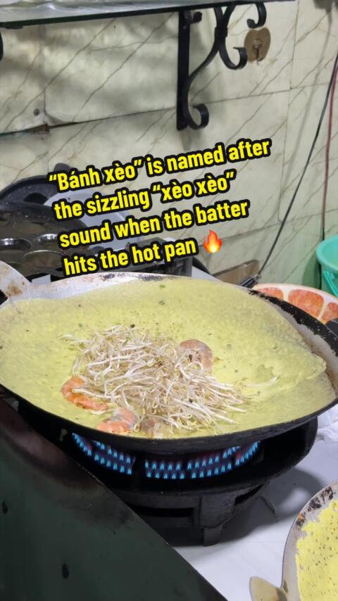 B&aacute;nh x&egrave;o is one of the most iconic street foods in Southern Vietnam &mdash; crispy, golden, loud, and impossible to ignore. The name &ldquo;b&aacute;nh x&egrave;o&rdquo; actually comes from the sizzling sound &ldquo;x&egrave;o x&egrave;o&rdquo; when the rice batter hits the hot pan. Southern-style b&aacute;nh x&egrave;o is big, thin, and extra crispy, made with turmeric rice batter and filled with shrimp, pork, bean sprouts, and green onions. You don&rsquo;t just eat it &mdash; you build it yourself. Tear off a piece of the crunchy pancake, wrap it in fresh herbs and lettuce, then dip everything into sweet fish sauce. The mix of crispy, juicy, fresh, smoky, sweet, and savory flavors all at once is what makes locals obsessed with it. It&rsquo;s messy, interactive, super local&hellip; and honestly one of the most satisfying foods to eat in Saigon. 😭 #foodtour #walkingtour #localguide #saigon #fyp 